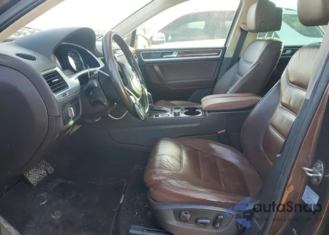 2012 Volkswagen Touareg V6 z USA, uszkodzony, nr VIN WVGFF9BP7CD001968